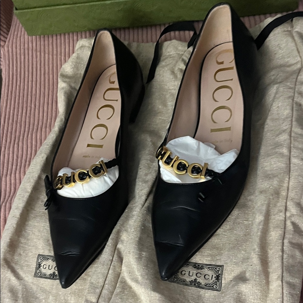 Gucci Black Leather Flats with Gold Accent